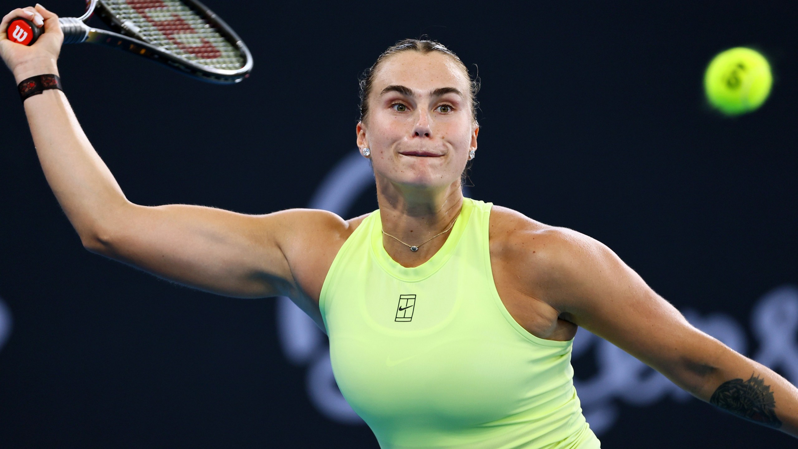 Aryna Sabalenka of Belarus plays a shot during the women's final match against Marta Kostyuk of Ukraine at the Brisbane International tennis tournament in Brisbane, Australia, Sunday, Jan. 11, 2026. (AP Photo/Tertius Pickard)