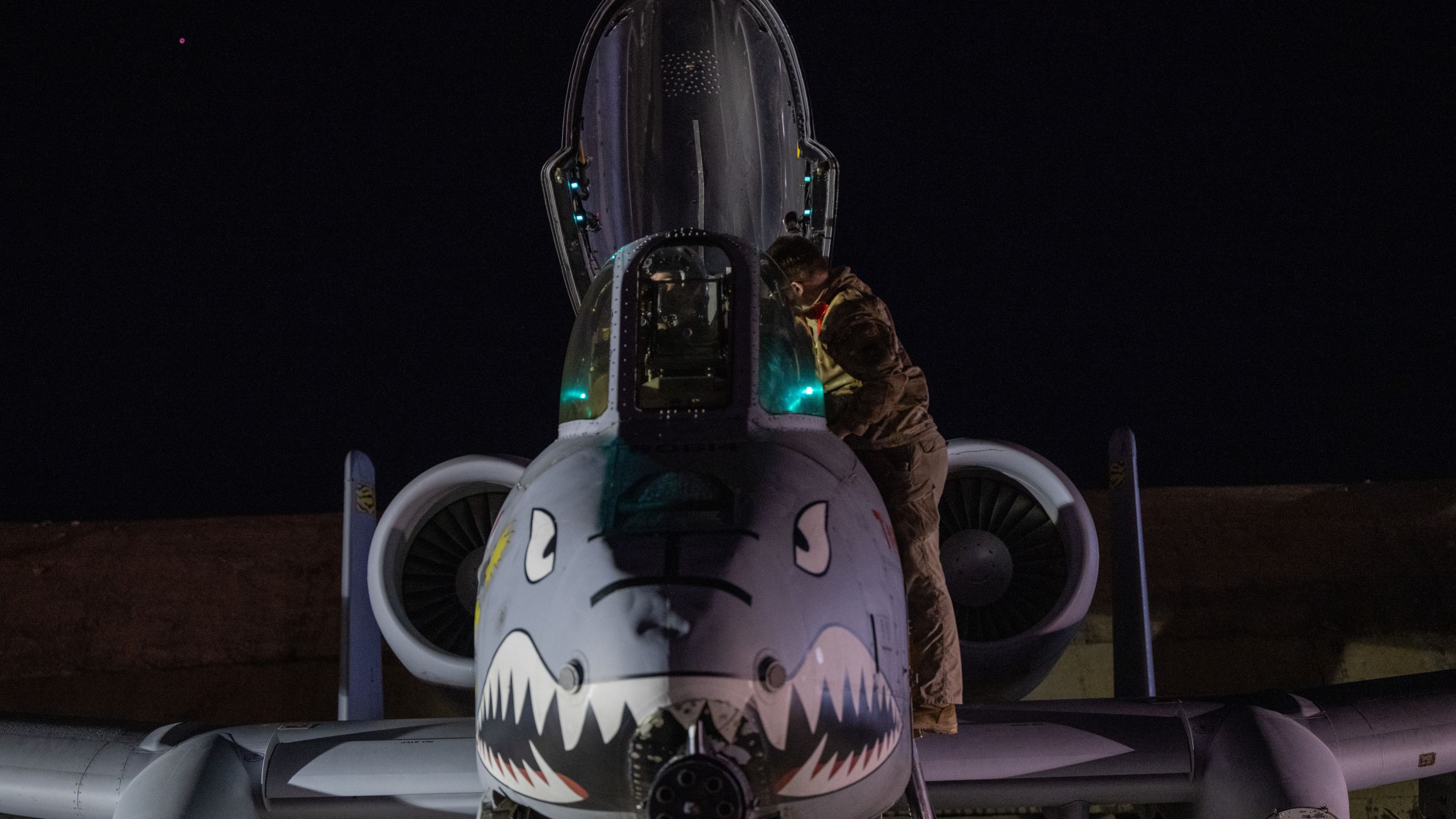 This photo provided by the U.S. Air Force shows a U.S. Airman preparing an A-10 Thunderbolt II for flight from a base in the U.S. Central Command area of responsibility, Friday, Dec. 19, 2025, in support of Operation Hawkeye Strike. (U.S. Air Force/DVIDS via AP)