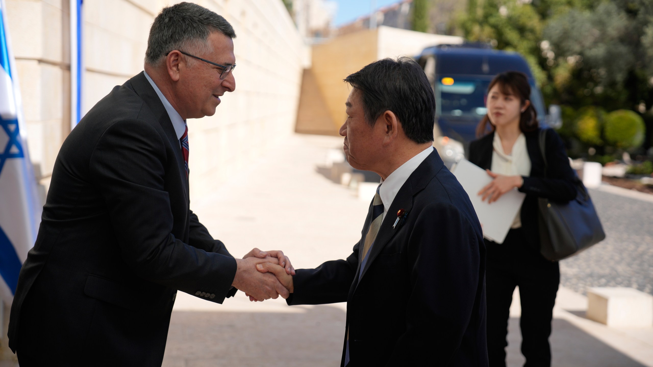 Israel's Foreign Minister Gideon Sa'ar, left, meets with Japan's Foreign Minister Toshimitsu Motegi in Jerusalem, Sunday, Jan. 11, 2026. (AP Photo/Ohad Zwigenberg)