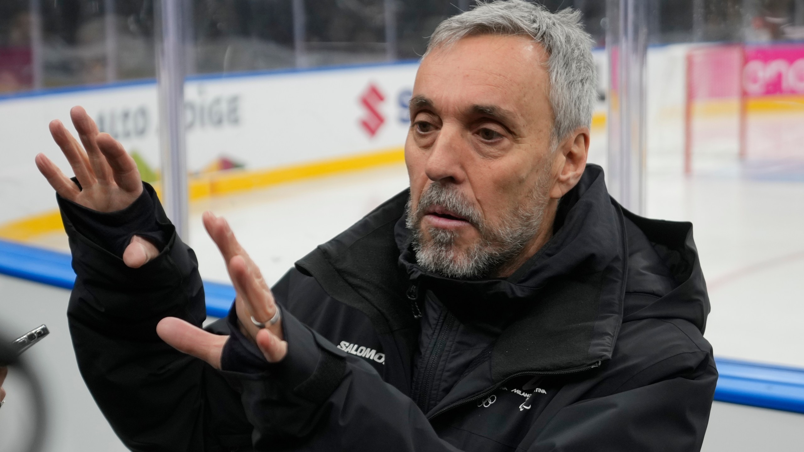 Andrea Varnier, CEO Fondazione Milano Cortina 2026 talks to reporters at the Santa Giulia Ice Hockey Arena, in Milan, where Ice Hockey discipline of the Milan Cortina 2026 Winter Olympics will take place, in Milan, Italy, Sunday, Jan. 11, 2026. (AP Photo/Luca Bruno)