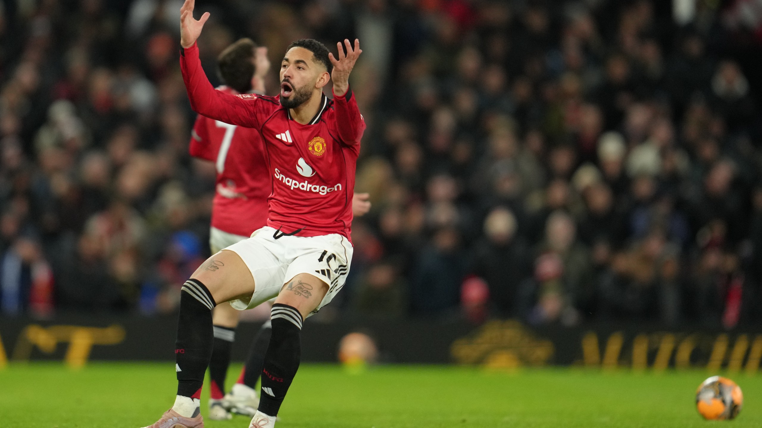 Manchester United's Matheus Cunha reacts during the FA Cup third round soccer match between Manchester United and Brighton in Manchester, England, Sunday, Jan. 11, 2026. (AP Photo/Jon Super)