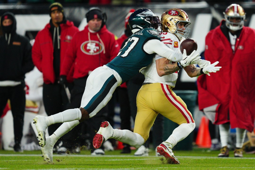 Philadelphia Eagles cornerback Quinyon Mitchell (27) breaks up a pass intended for San Francisco 49ers tight end George Kittle (85) during the first half of an NFL wild-card playoff football game Sunday, Jan. 11, 2026, in Philadelphia. (AP Photo/Derik Hamilton)
