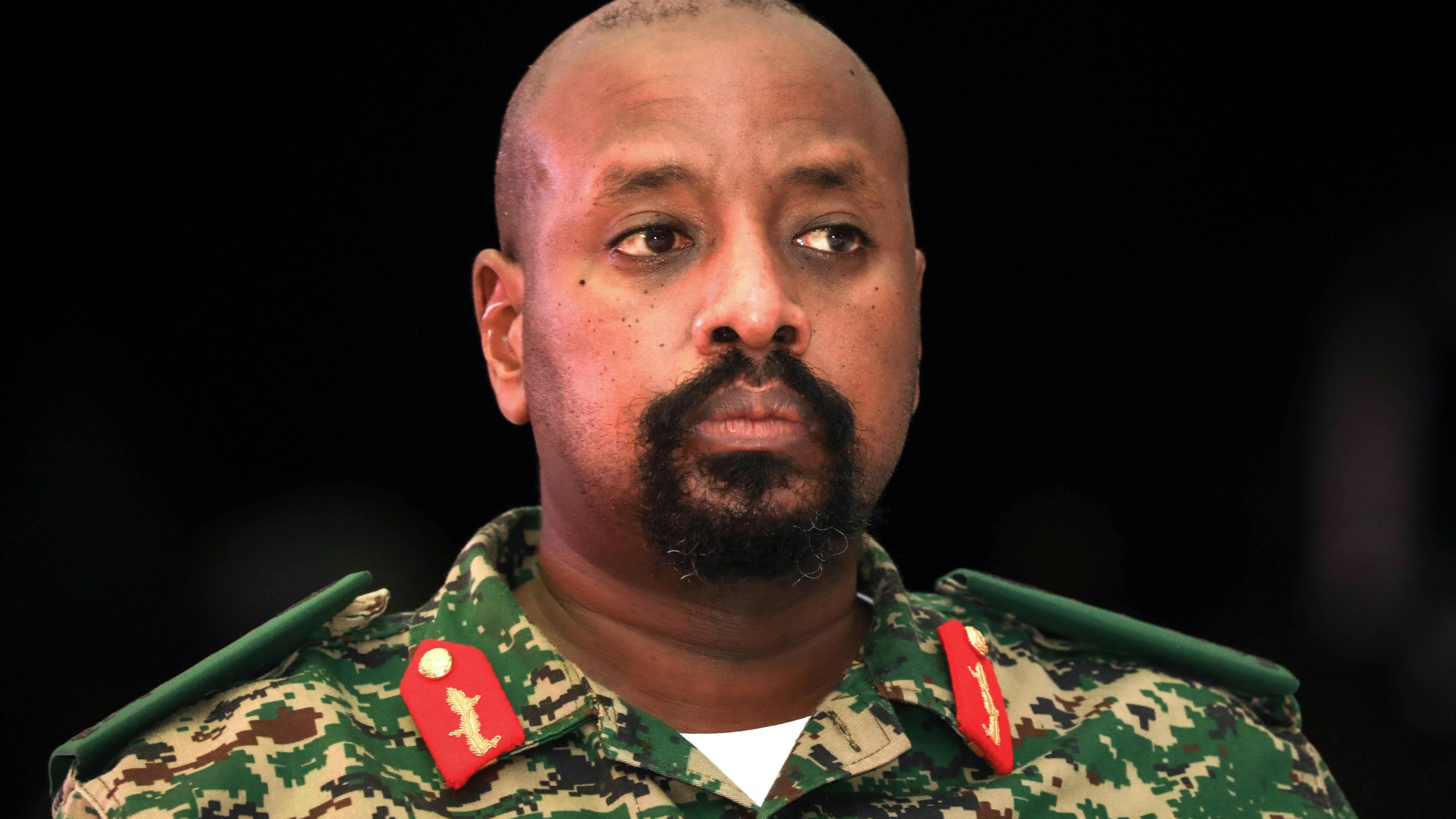 FILE - Lt. Gen. Muhoozi Kainerugaba, son of Uganda's President Yoweri Museveni, attends a "thanksgiving" ceremony in Entebbe, Uganda, May 7, 2022. (AP Photo/Hajarah Nalwadda, File)