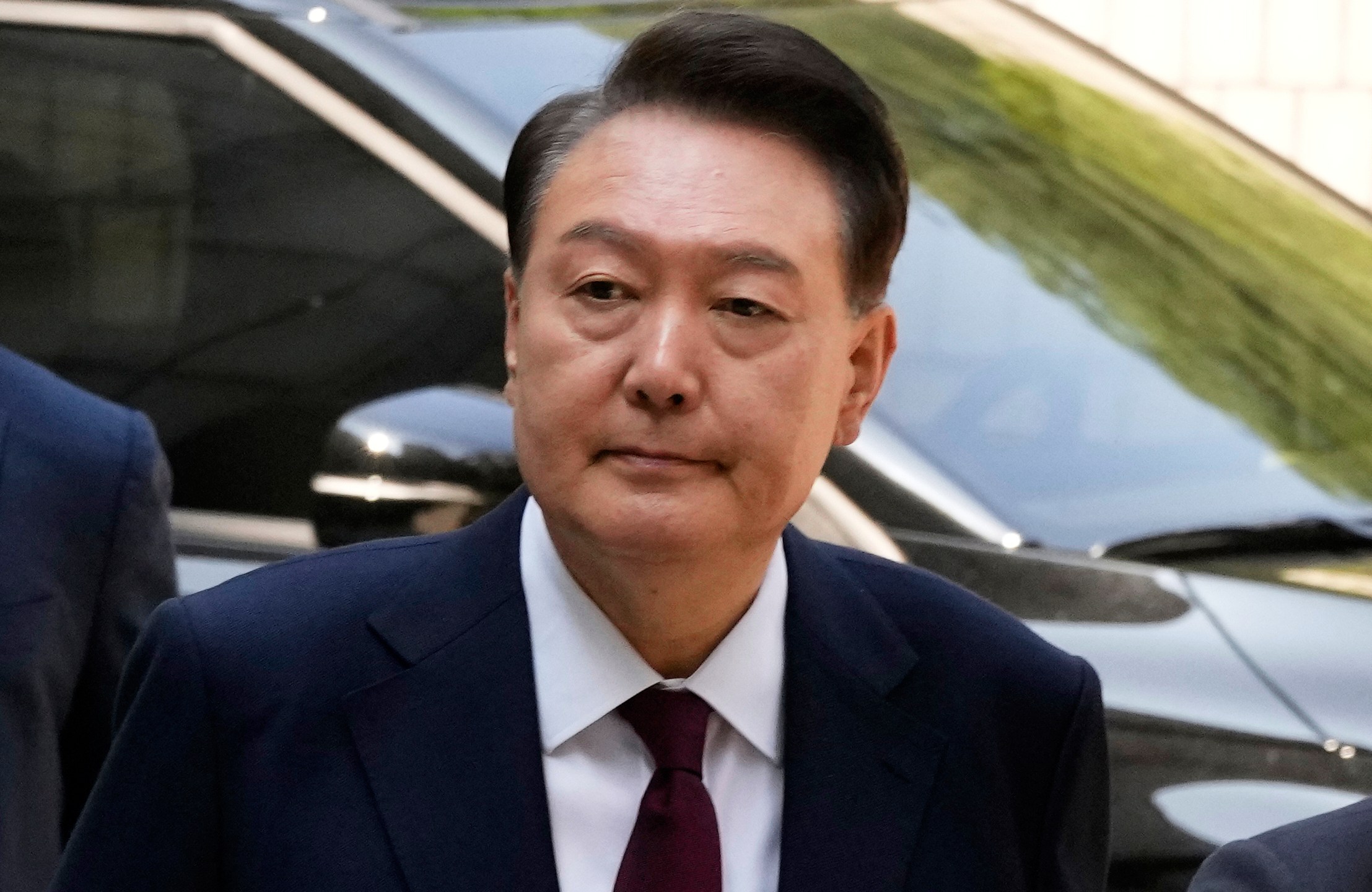 FILE - Then South Korea's ousted former President Yoon Suk Yeol who is facing charges of orchestrating a rebellion when he declared martial law on Dec. 3, arrives to attend his trial at the Seoul Central District Court in Seoul, South Korea, Monday, May 12, 2025. (AP Photo/Ahn Young-joon, Pool, File)