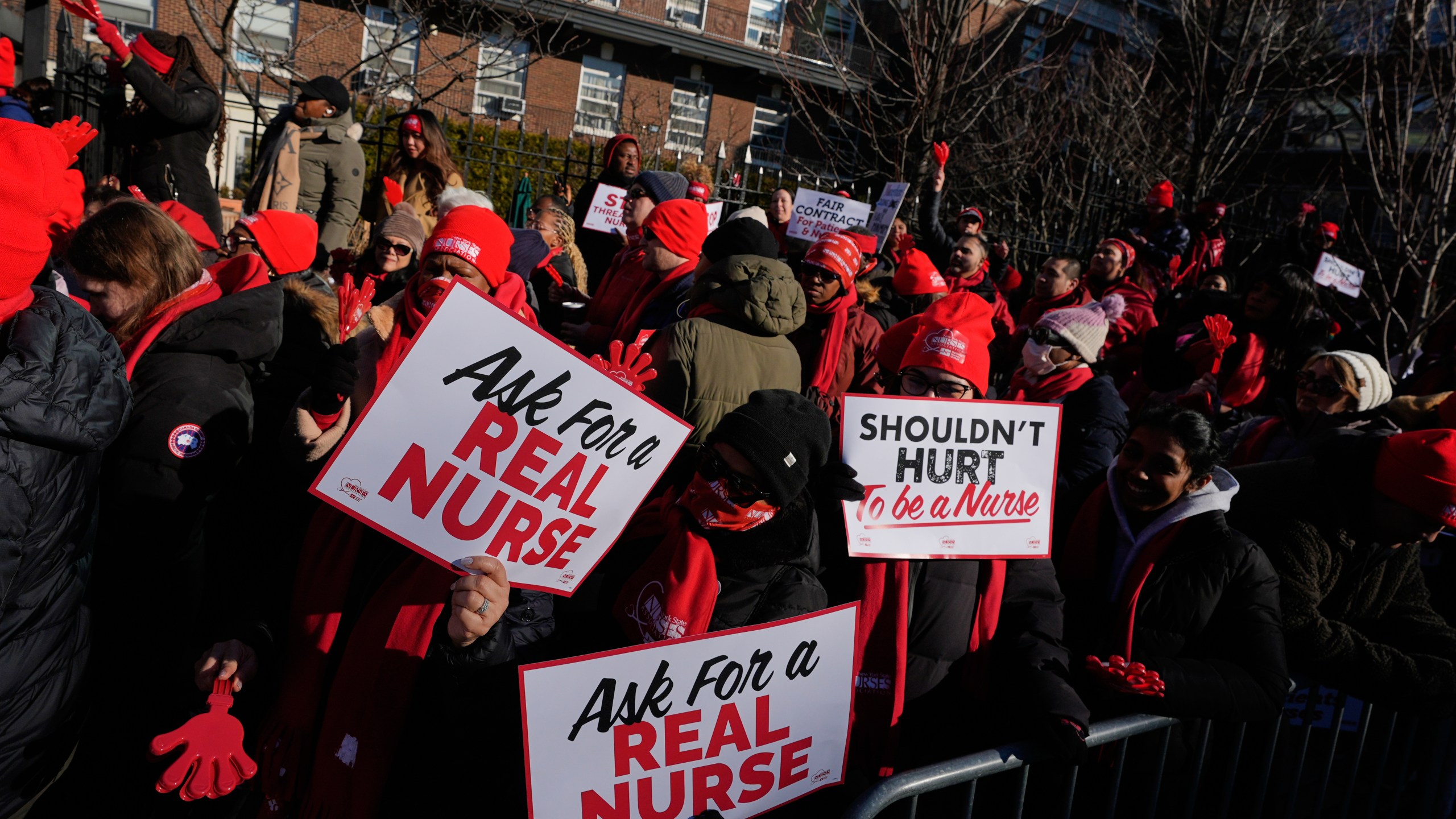 Nurses strike in front of Montefiore Hospital in the Bronx borough of New York, Tuesday, Jan. 13, 2026. (AP Photo/Seth Wenig)