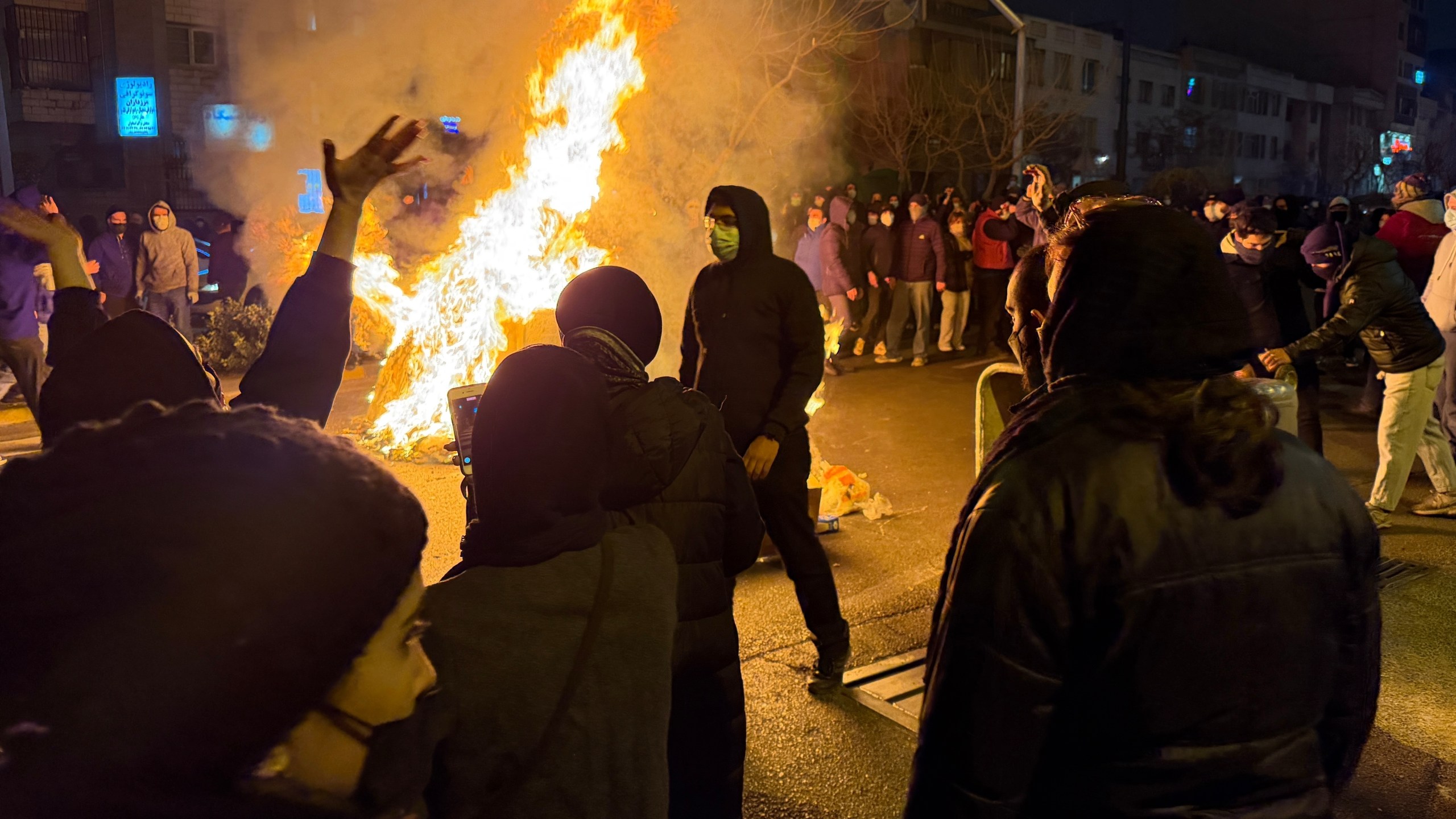 In this photo obtained by The Associated Press, Iranians attend an anti-government protest in Tehran, Iran, Friday, Jan. 9, 2026. (UGC via AP)
