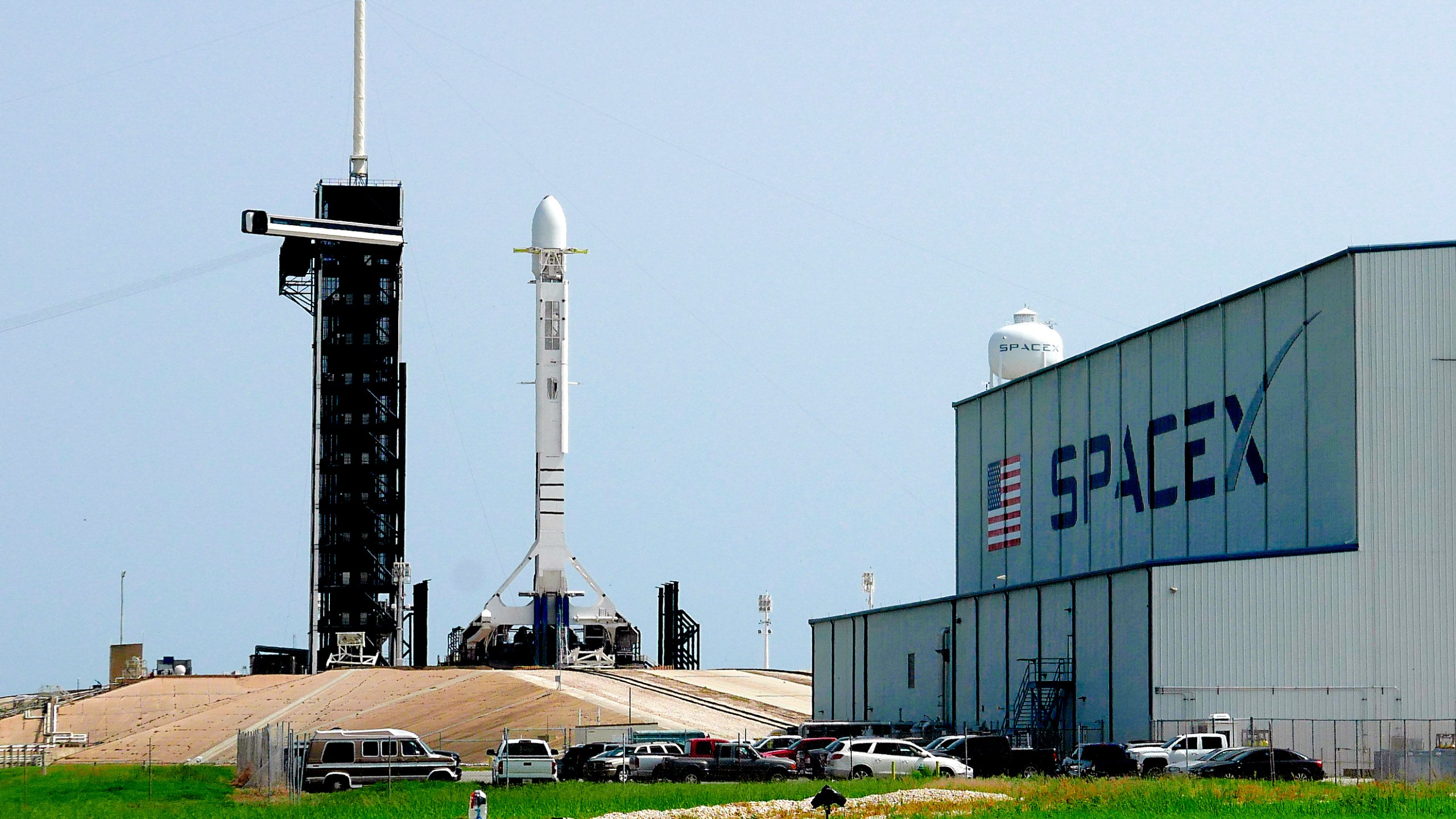 FILE - A Falcon 9 SpaceX rocket stands ready for launch at pad 39A at the Kennedy Space Center in Cape Canaveral, Fla., Friday, June 26, 2020. (AP Photo/John Raoux, file)