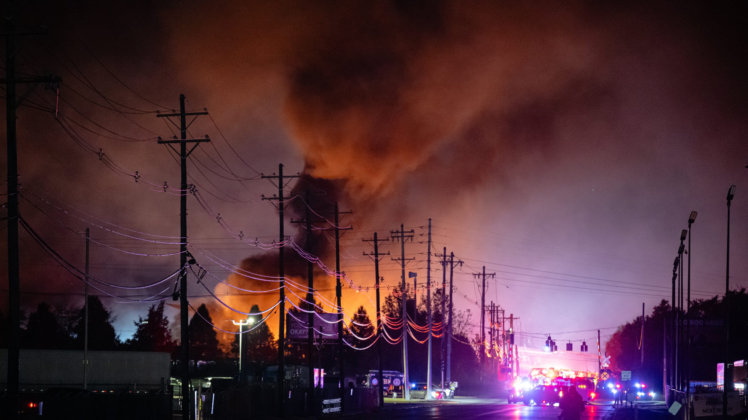 FILE - Plumes of smoke rise from the area of a UPS cargo plane crash at Louisville Muhammad Ali International Airport, on Tuesday, Nov. 4, 2025, in Louisville, Ky. (AP Photo/Jon Cherry, File)