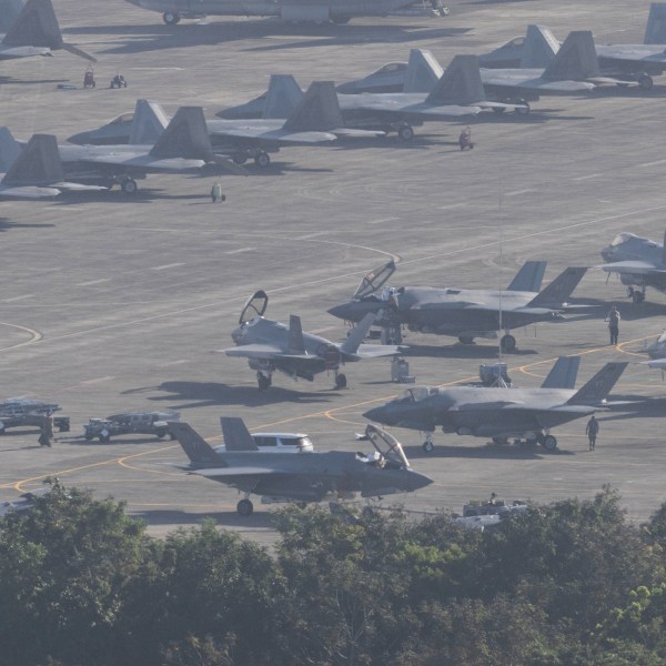Planes parked on a tarmac at Jose Aponte de la Torre Airport in Puerto Rico.