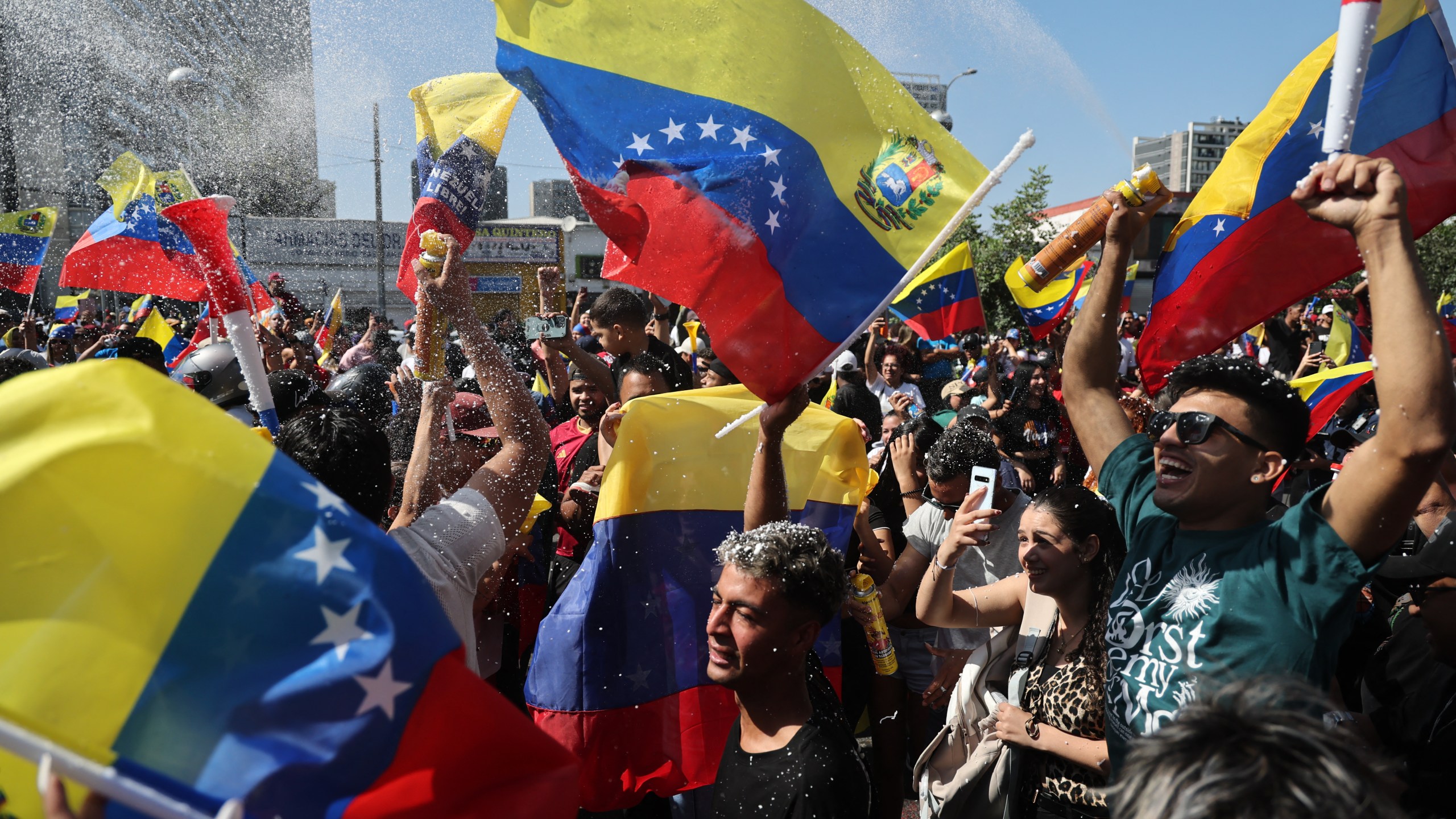 Venezuelans living in Chile celebrate in Santiago on January 3