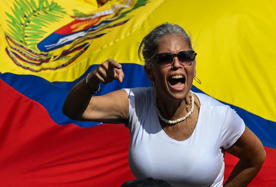A woman shouts slogans during a rally in support of ousted Venezuela's President Nicolas Maduro