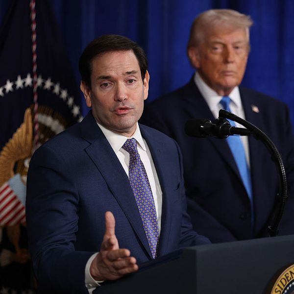 Secretary of State Marco Rubio speaks while President Donald Trump watches during a news conference