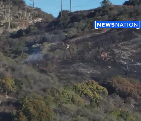 Drone images appears to show smoke above the spot where the Pacific Palisades Fire ignited