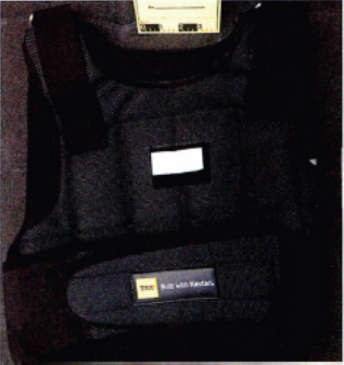 Pictures provided in a press release of the weapons and attack plans the FBI found in the home of Christian Sturdivant. 